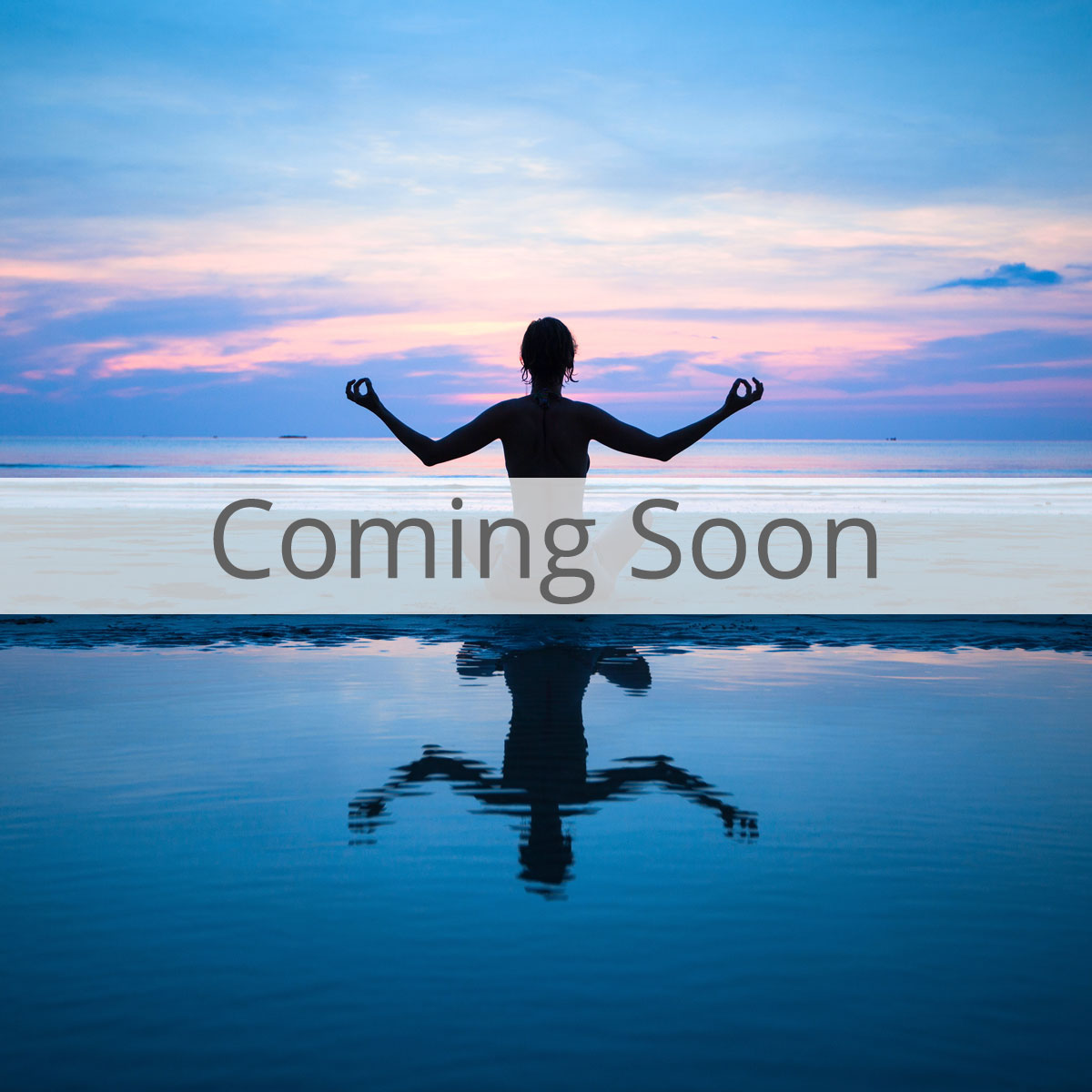 Person Meditating on Beach